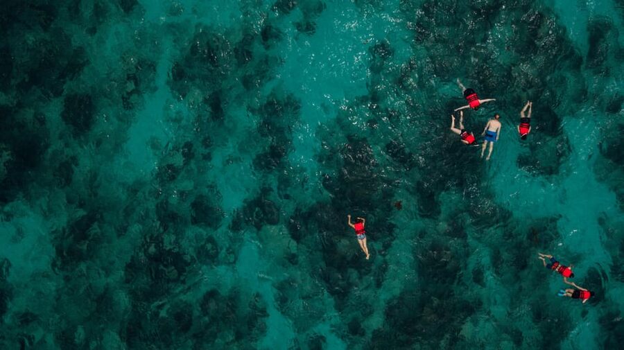 Chania: Boat Trip with Guided Snorkeling Tour - Fruit, water, and a reset on the boat