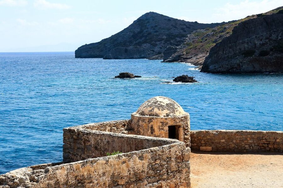 Crete: Day Trip to Agios Nikolaos and Spinalonga Island - The boat ride across Mirabello Bay