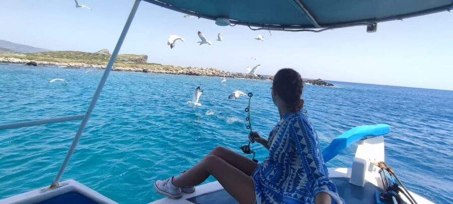 Crete: Fishing & Swimming Boat Cruise with Lunch & Drinks - Leaving Elounda for a working fishing day