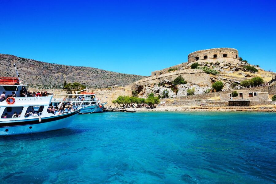 Elounda: Spinalonga Guided Boat Tour with BBQ and Swimming - The 20-minute crossing to Kolokytha