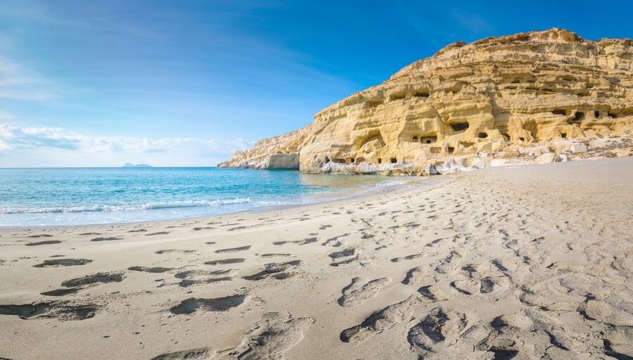 From Heraklion: Day Trip to Matala Hippie Beach and Caves - Climbing into the former Roman tombs