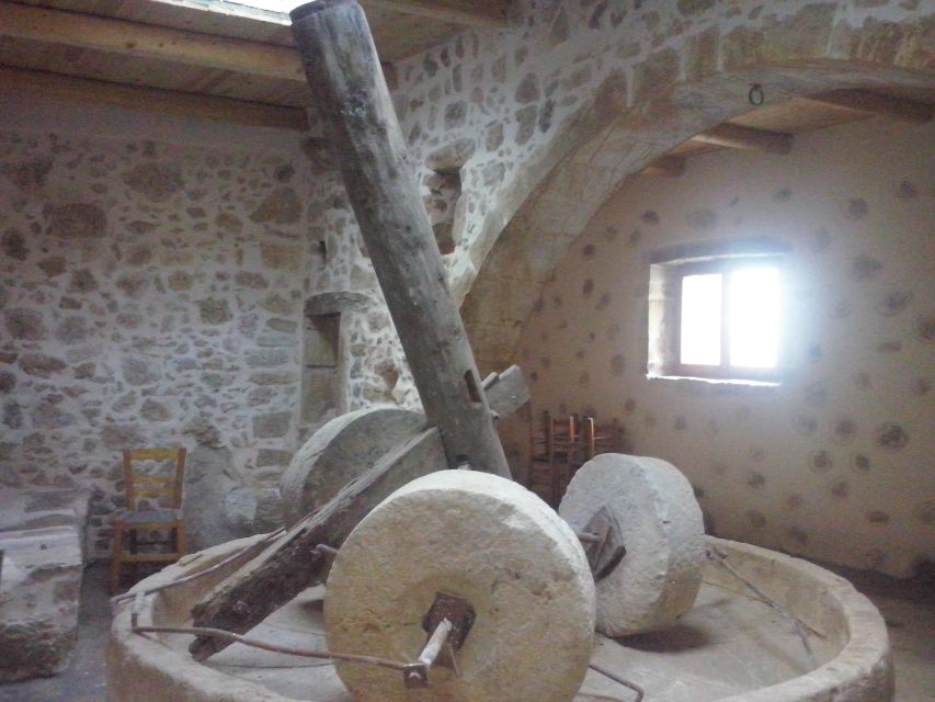 From Rethymno: Arkadi, Melidoni, and Margarites Tour - Lunch, music, and dancing at the family taverna