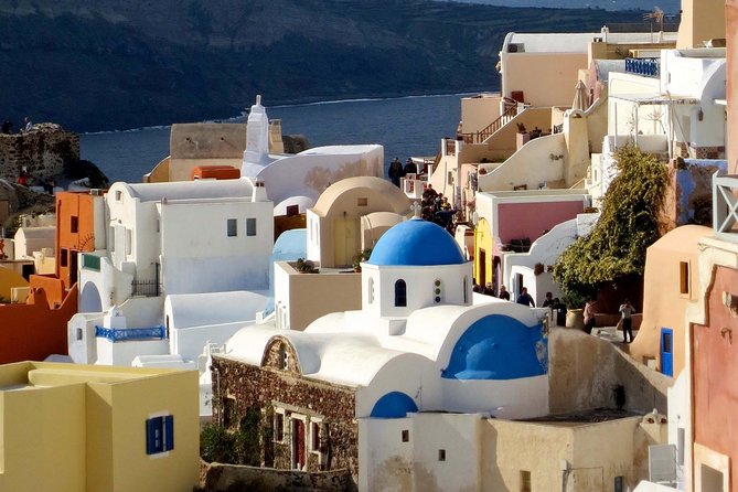 Full-Day Trip to Santorini island by Boat from Heraklion - Fira: shops, cafés, and caldera views