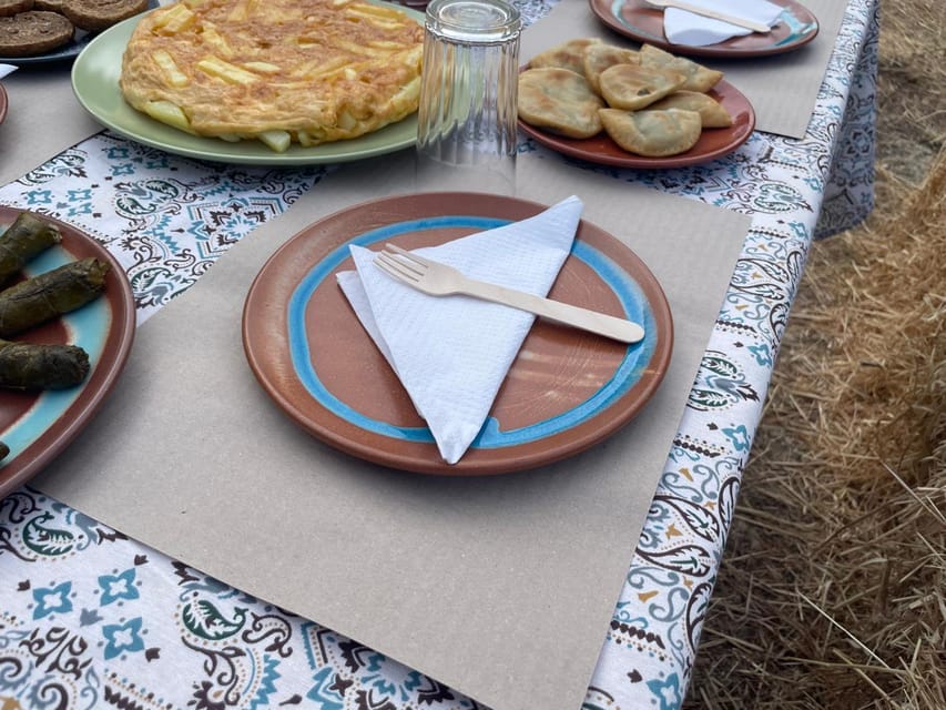 Heraklion: Cretan Farmers Brunch and Olive Grove Tour - Outdoor seating, rain plans, and the pace of 90 minutes