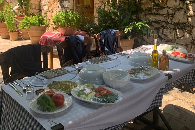 Heraklion: Cretan private cooking lesson with lunch in Arolithos - Lunch, local wine, and views toward Heraklion