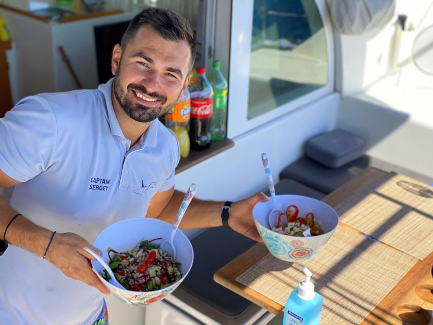 Heraklion: Dia Catamaran Tour - Lunch, Open Bar & Snorkeling - Lunch on board, with seafood, meat, and special diets
