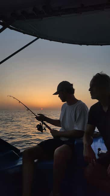 Hersonissos: Agapi Fishing Trips Sunset Cruise - Drinks, fruit, and the simple onboard setup