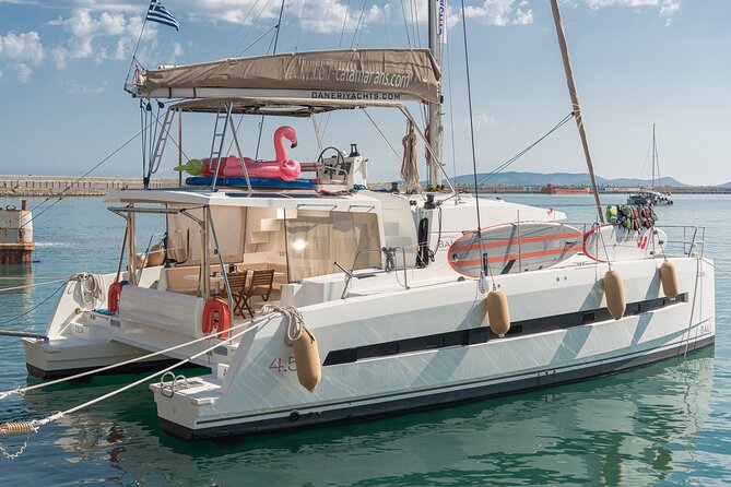 Hersonissos: Luxury Sunset Catamaran Cruise Sushi & Open Bar - Saint George Bay, cliffs, and a quiet chapel