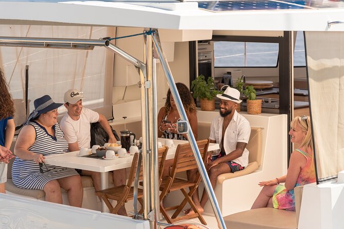 Hersonissos: Luxury Sunset Catamaran Cruise Sushi & Open Bar - Swimming, snorkeling, and paddleboarding