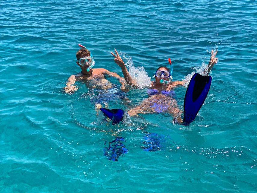 Hersonissos: Sunset Catamaran Cruise with Snacks and Drinks - The return sail and sunset at sea