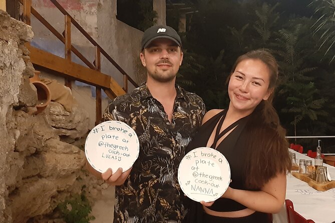 Kissamos: Greek Night Experience with Dancing and Buffet Dinner - Dancing, plates, and joining in