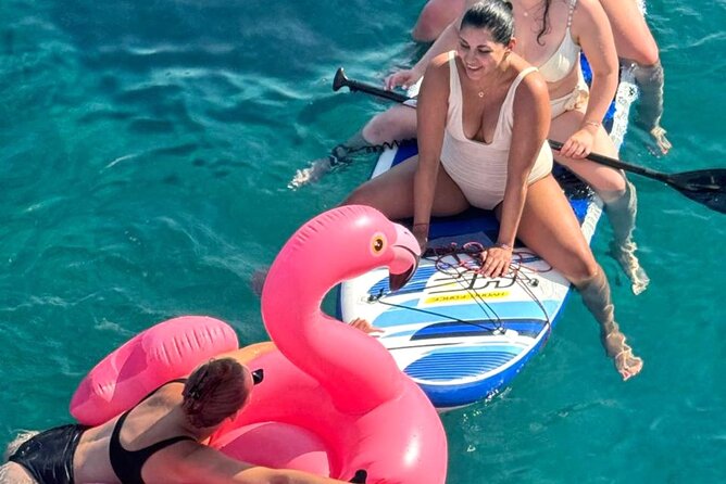 Panormo: Luxury Catamaran Cruise with Lunch & Open Bar - A swimming bay with SUP boards and snorkeling gear