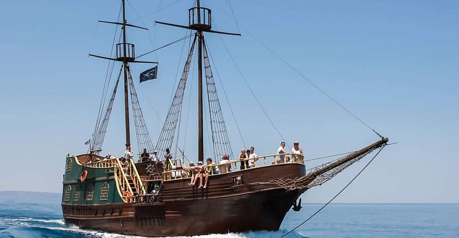 Rethymno: Sunset Cruise on a Wooden Pirate Boat - Leaving the harbor with the fortress in view
