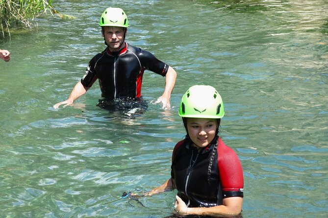 River Trekking at Kourtaliotiko Gorge - Swimming through the cold water to the waterfall