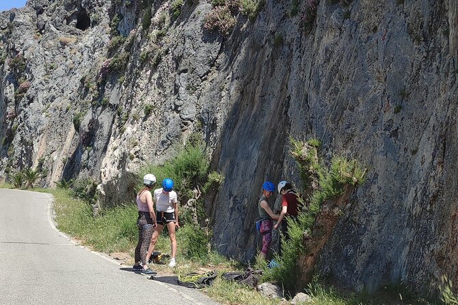 Rock Climbing on Crete with a Guide at Rethymnon, Plakias beach - Rappelling down after the climb